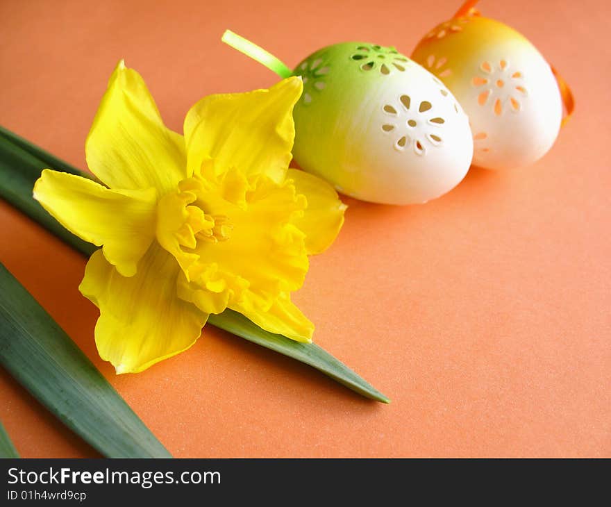 Easter still life, eggs on orange background