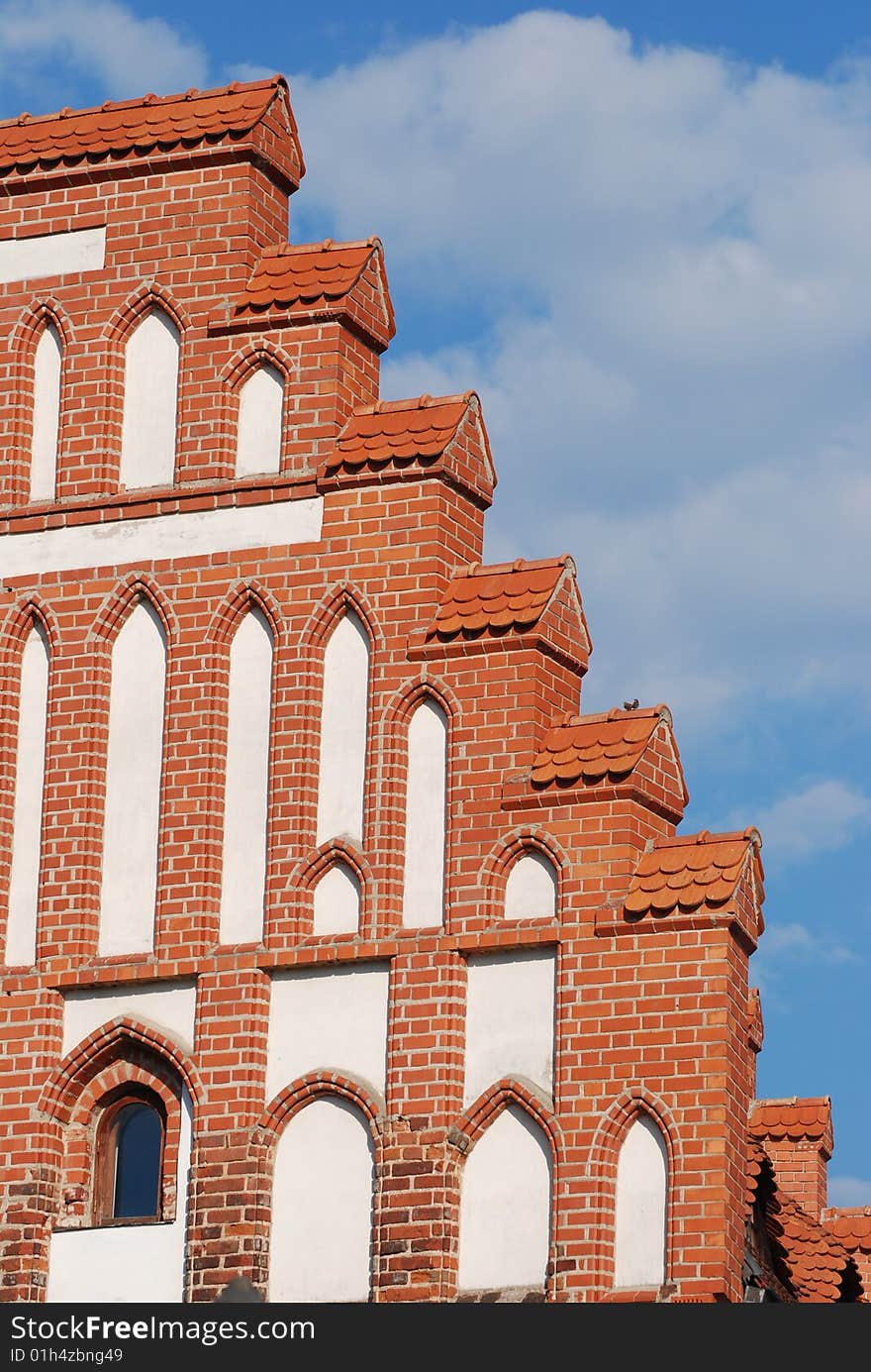 Medieval building in the background of the blue sky. Medieval building in the background of the blue sky