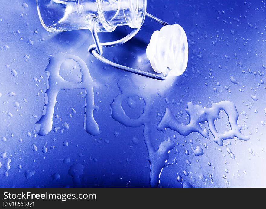 Mineral water drops on blue light background