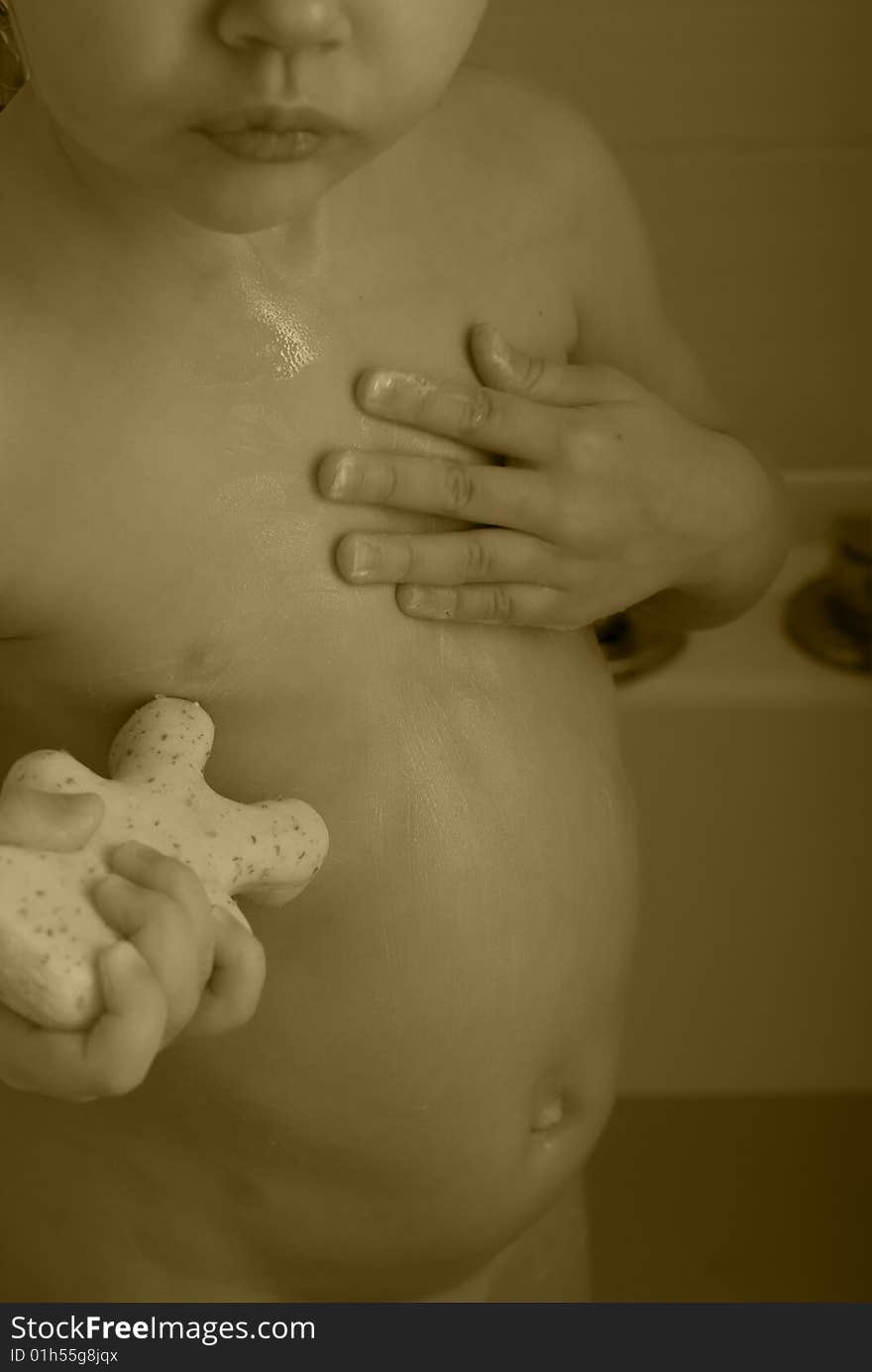 Lovely washing baby-girl with soap. Lovely washing baby-girl with soap