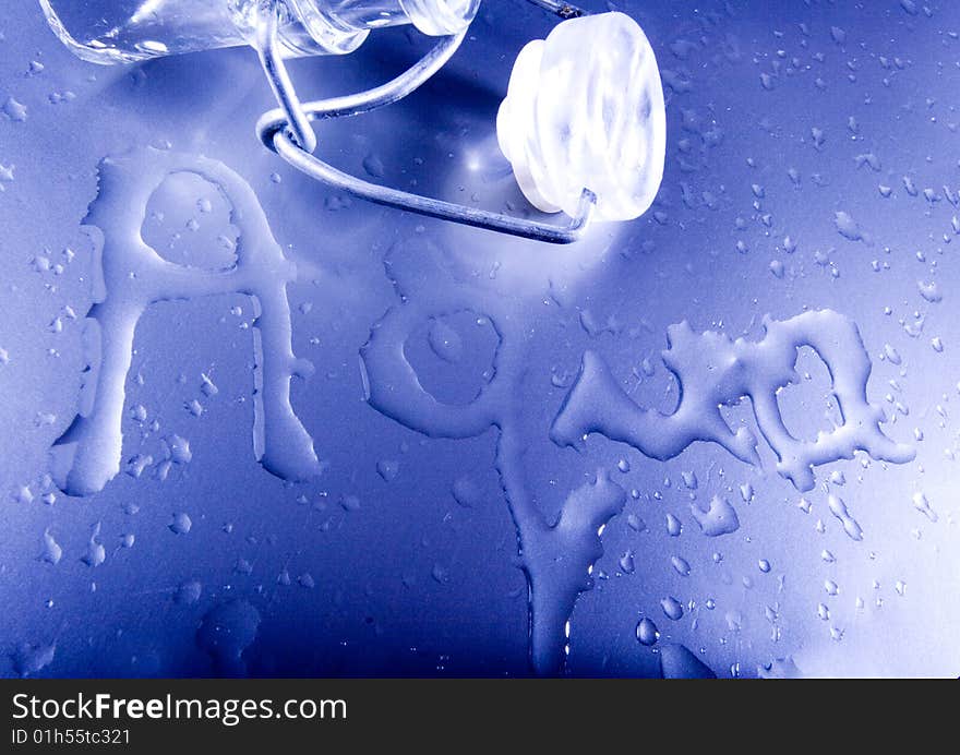 Mineral water drops on blue light background