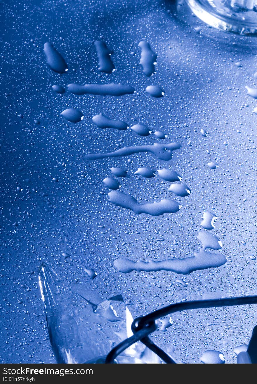 Mineral water drops on blue light background