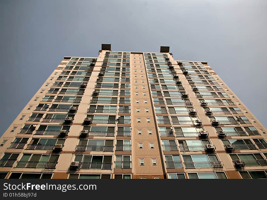 High Rise Apartment against slate blue sky