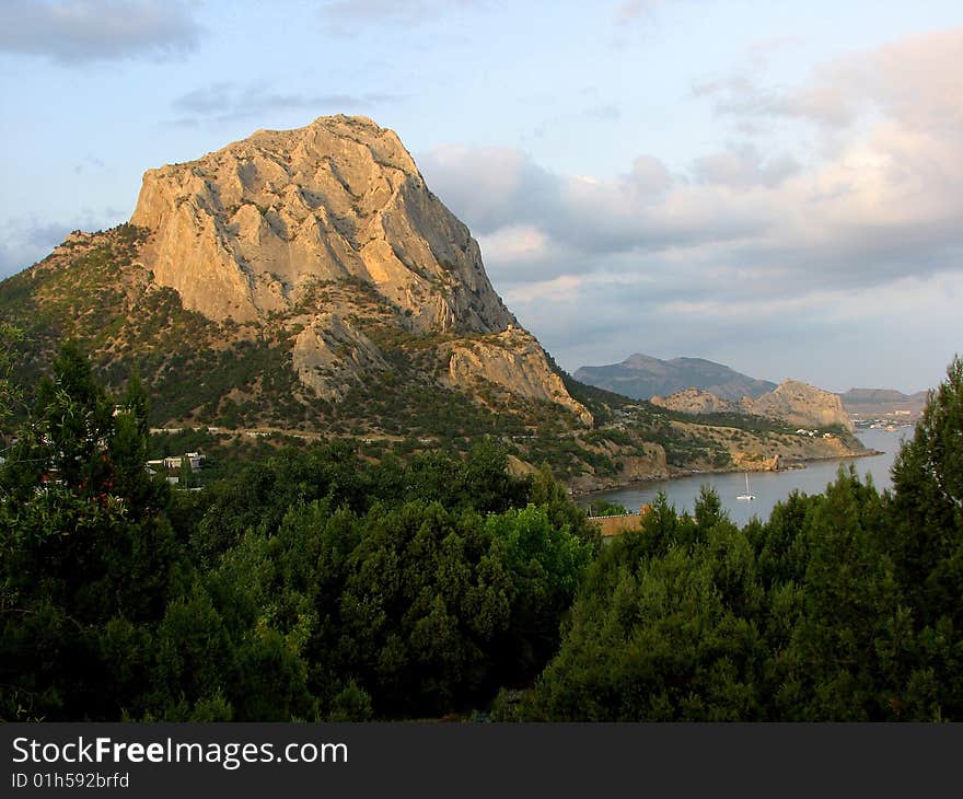 Evening mountainous coast.