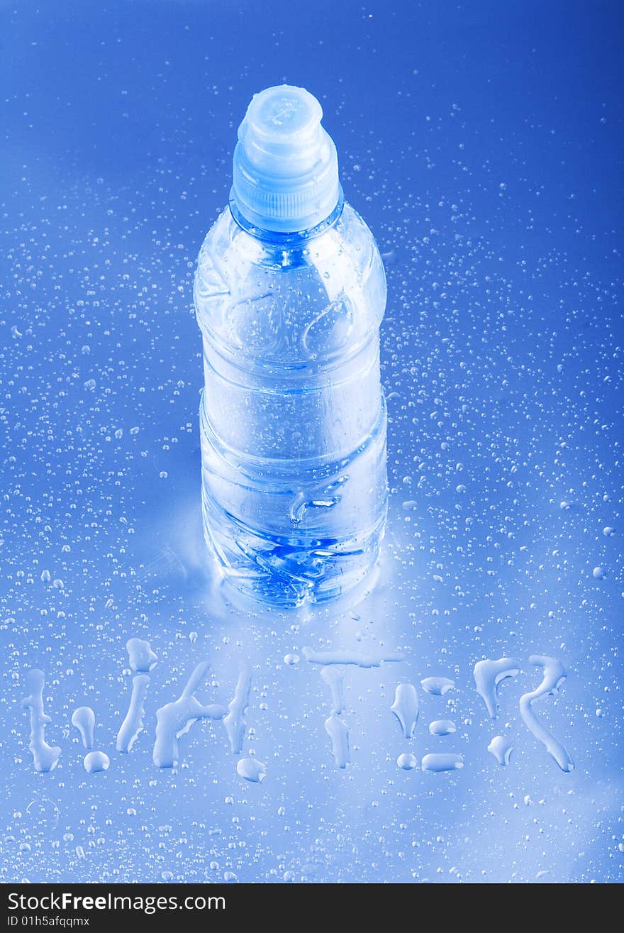 Mineral water in blue bottle