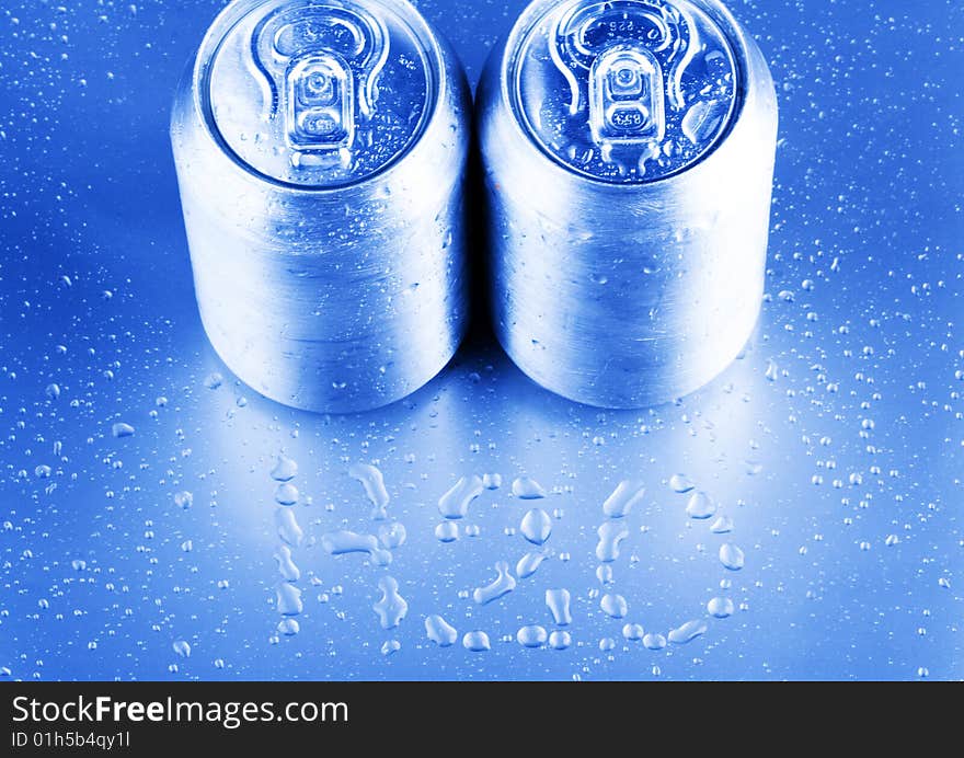 Silver tins and water drops