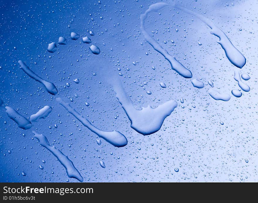 Mineral water drops on blue light background