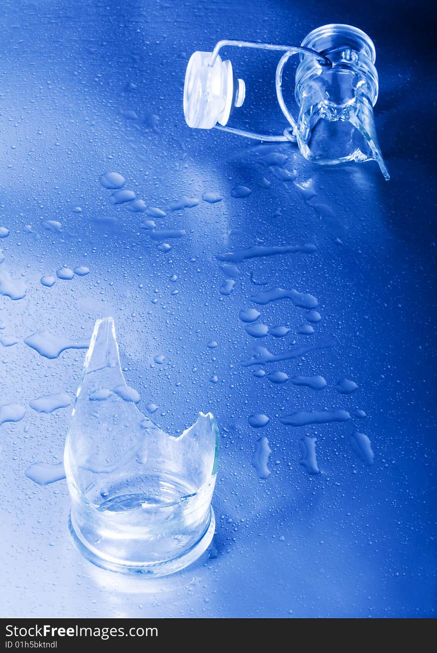 Mineral water drops on blue light background