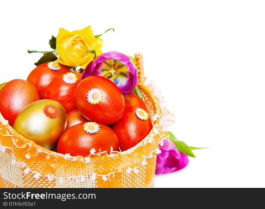 Easter Basket With Red And Golden Eggs Over White