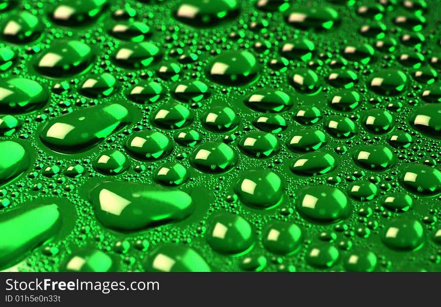 Beautiful green drops of water