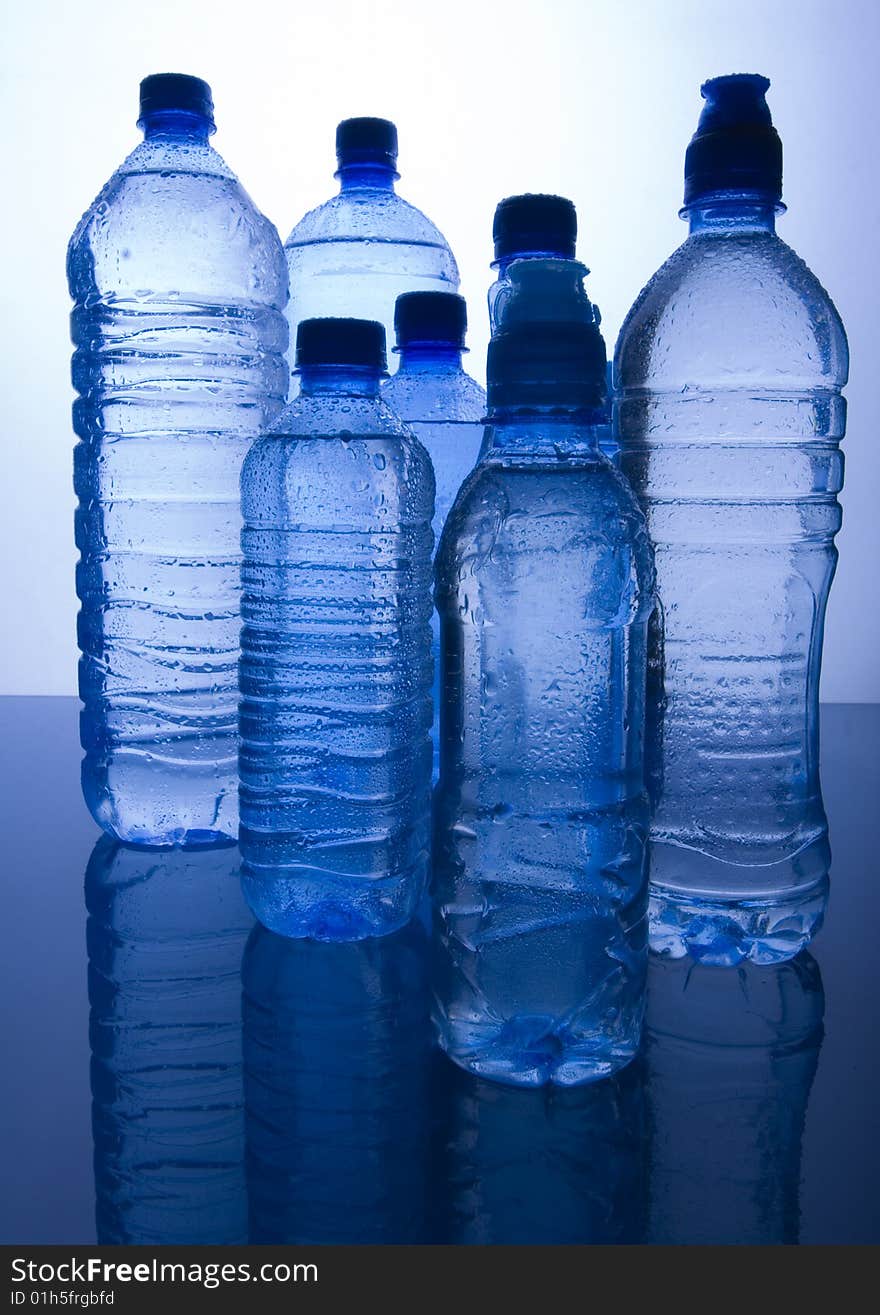 Mineral water in blue bottles