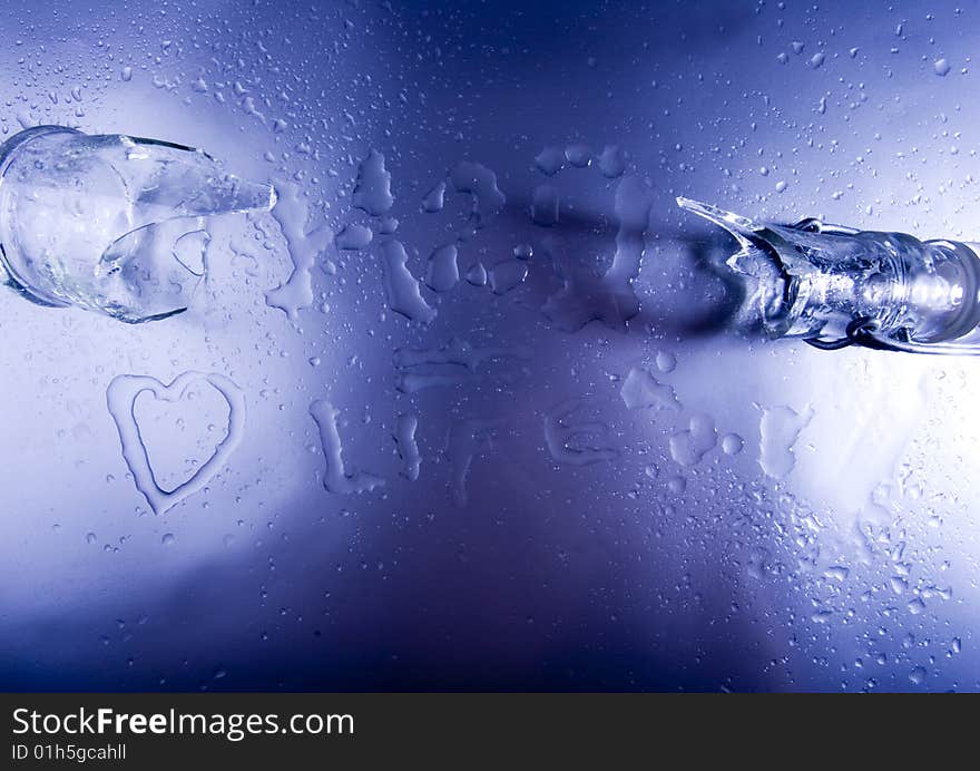 Mineral water drops on blue light background