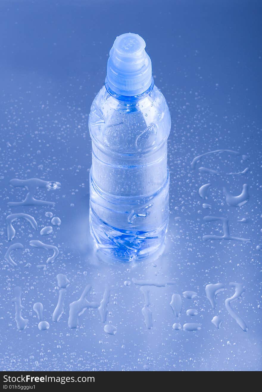 Mineral water in blue bottle