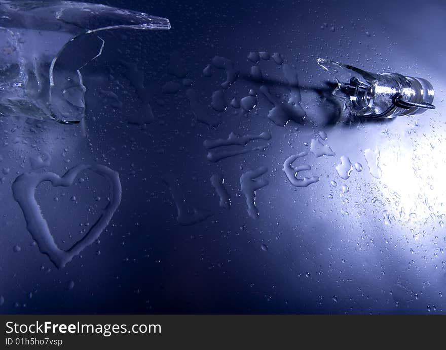 Mineral water drops on blue light background