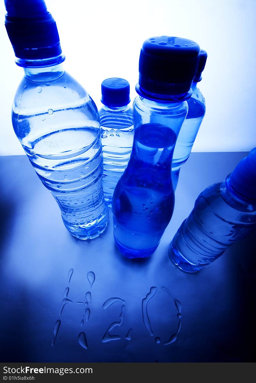 Mineral water in blue bottles