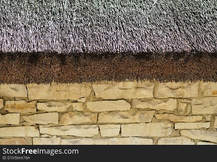 Thatched Roof And Stone Wall