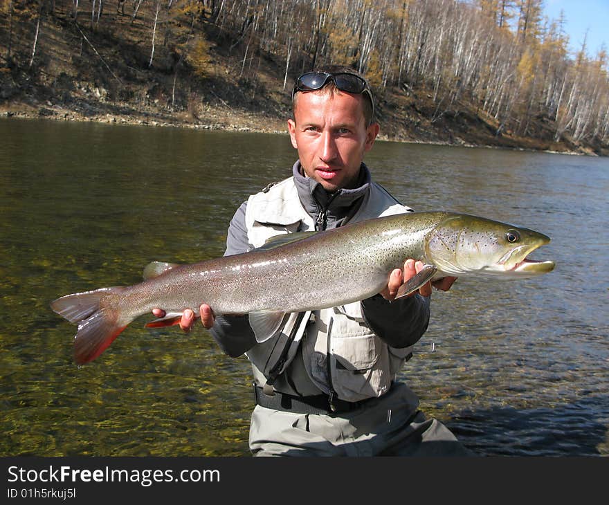 Fisherman with fish