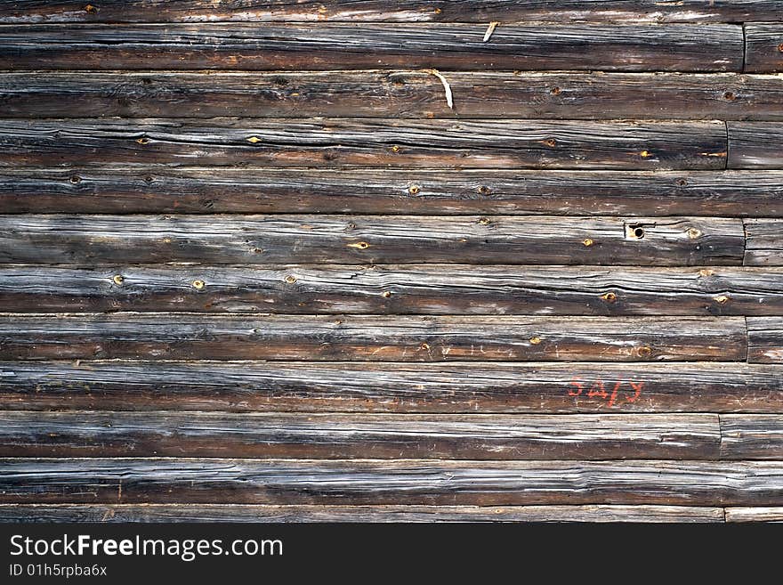 Old rural wall made with logs. Old rural wall made with logs