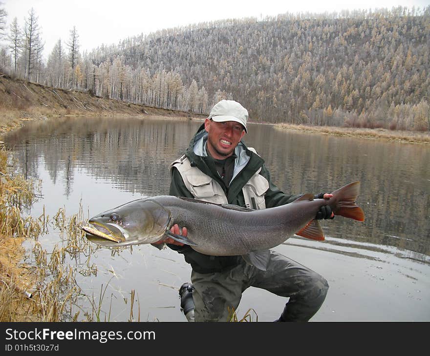 Fishing - fisherman with giant fish