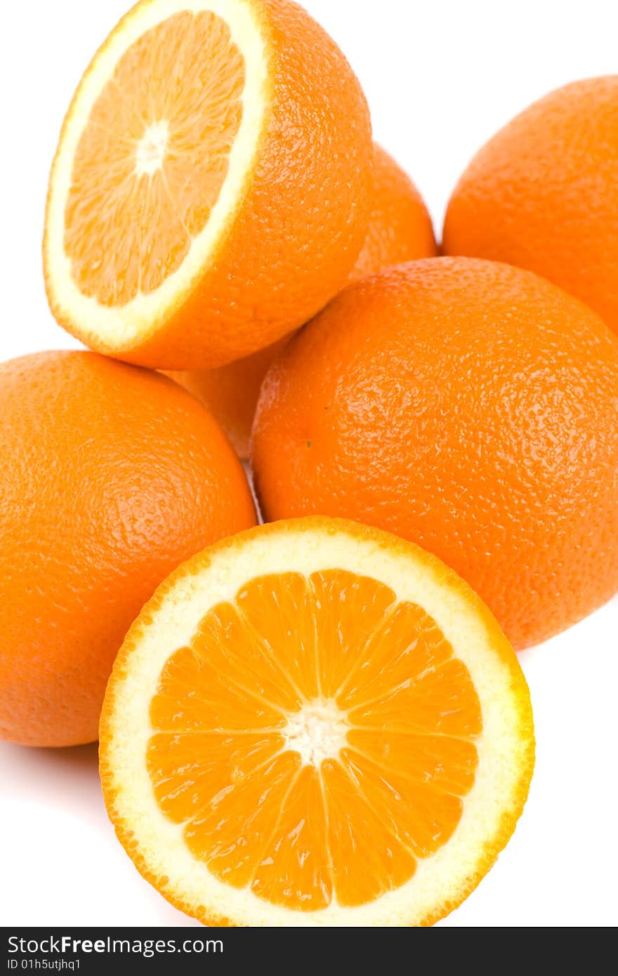 Fresh oranges closeup on white background