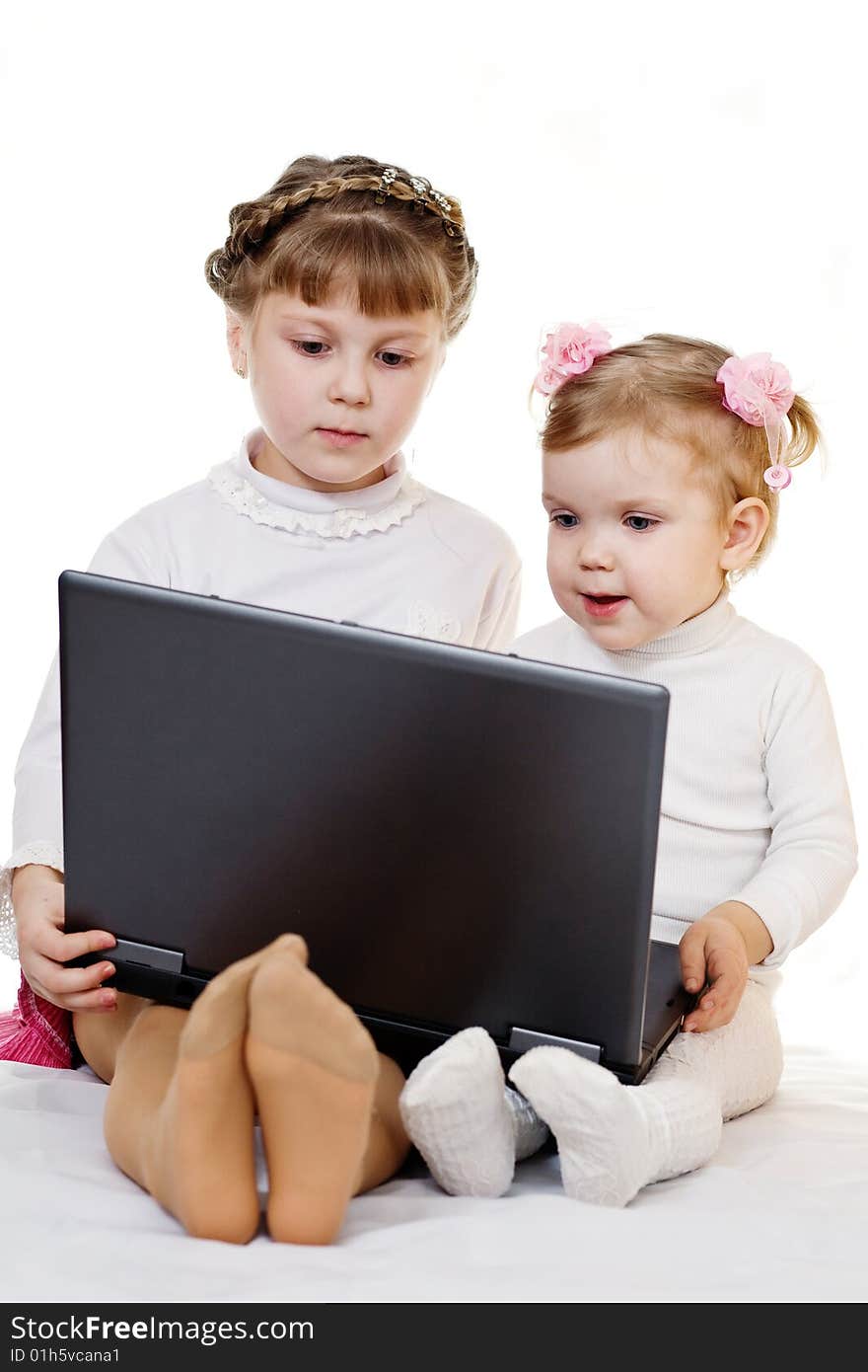 Stock photo: an image of happy girls with laptop