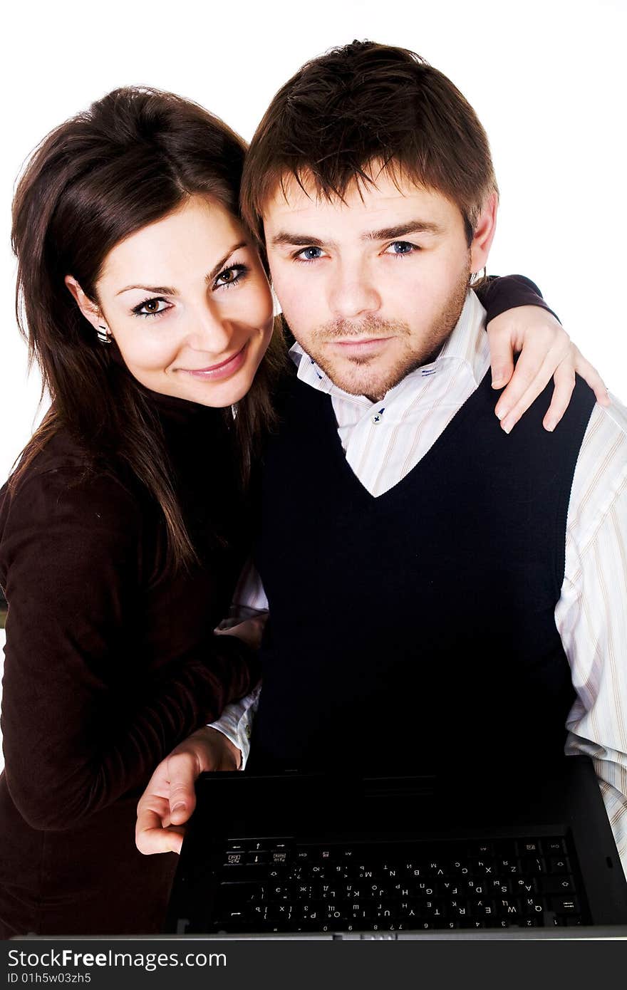 Stock photo: an image of a happy couple with laptop