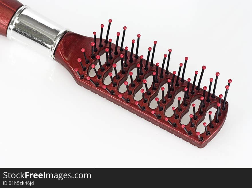 Plastic Hairbrush isolated over bright background