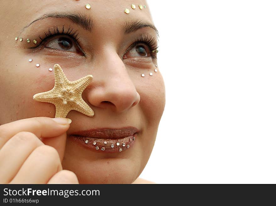 Women with makeup and little seastar. Women with makeup and little seastar