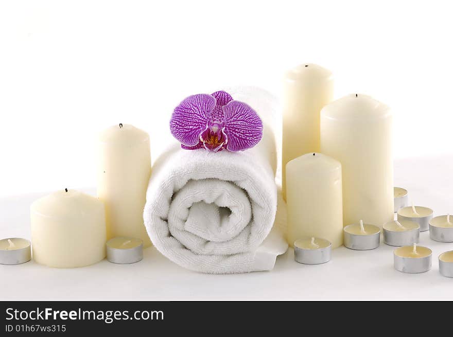 Beautiful orchid , towel on mat. Beautiful orchid , towel on mat