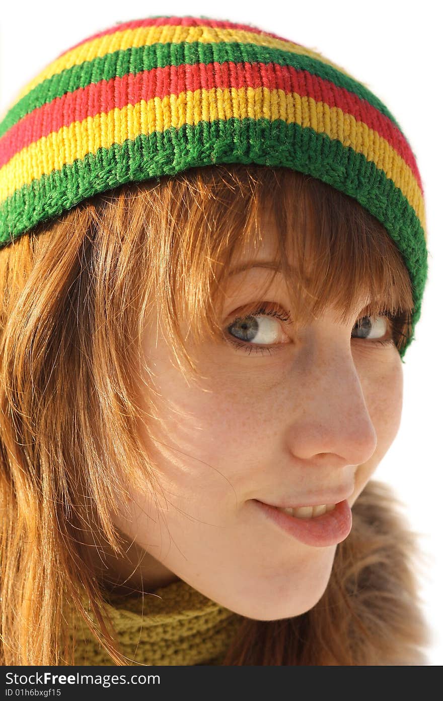 Smiling young women in colored hat