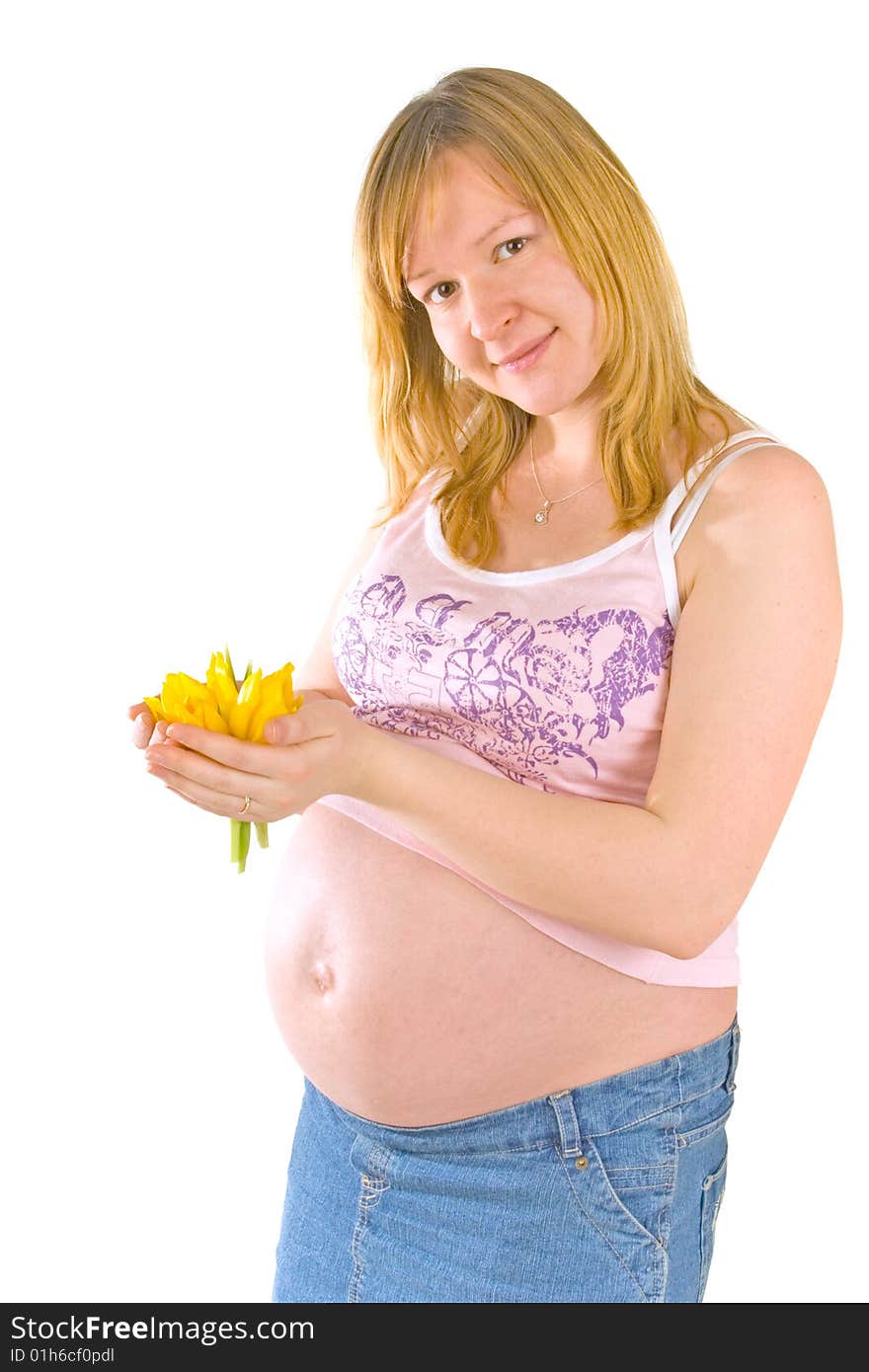 Pregnant woman with yellow flowers on white background