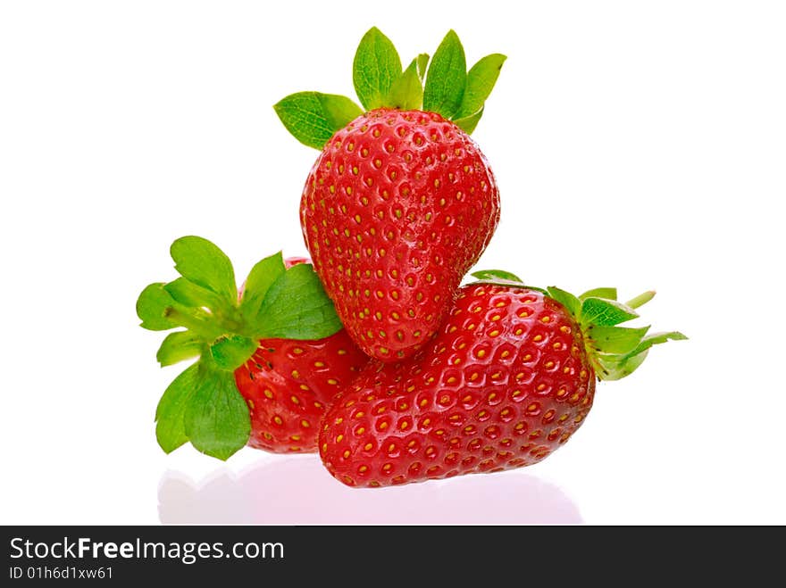 Three delicious strawberries isolated on white background