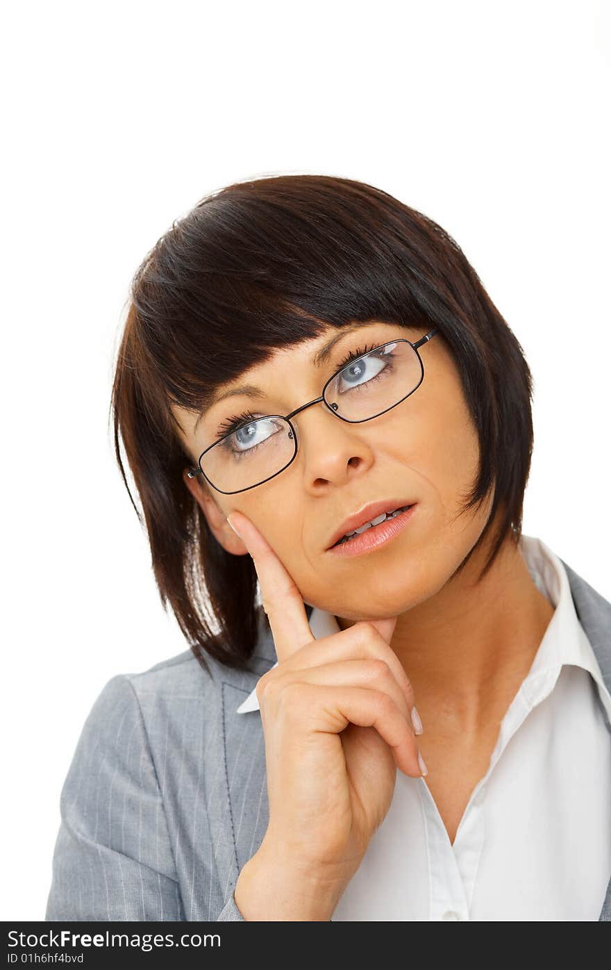 Portrait of a nice looking woman isolated on white, thinking. Portrait of a nice looking woman isolated on white, thinking