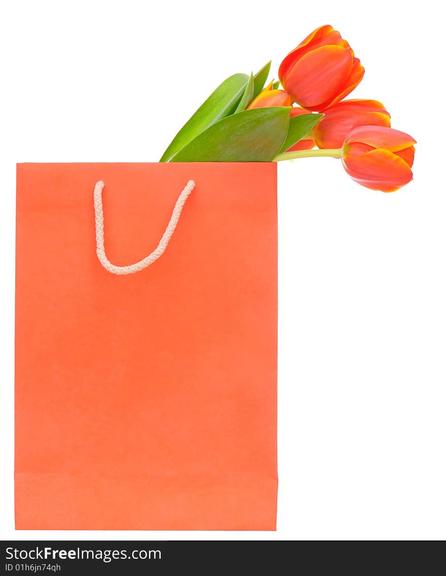 Red shopping bag with tulips isolated on white. Red shopping bag with tulips isolated on white.