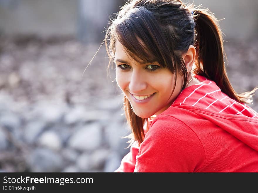 Smiling young girl staring at camera. Smiling young girl staring at camera.