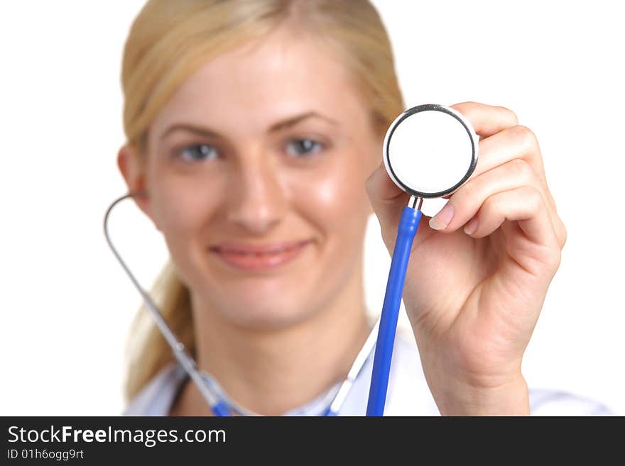 Woman Doctor Holding Stethoscope in focus isolated on white