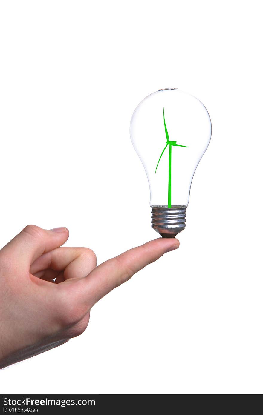 Person holding a modern green light bulb in the studio