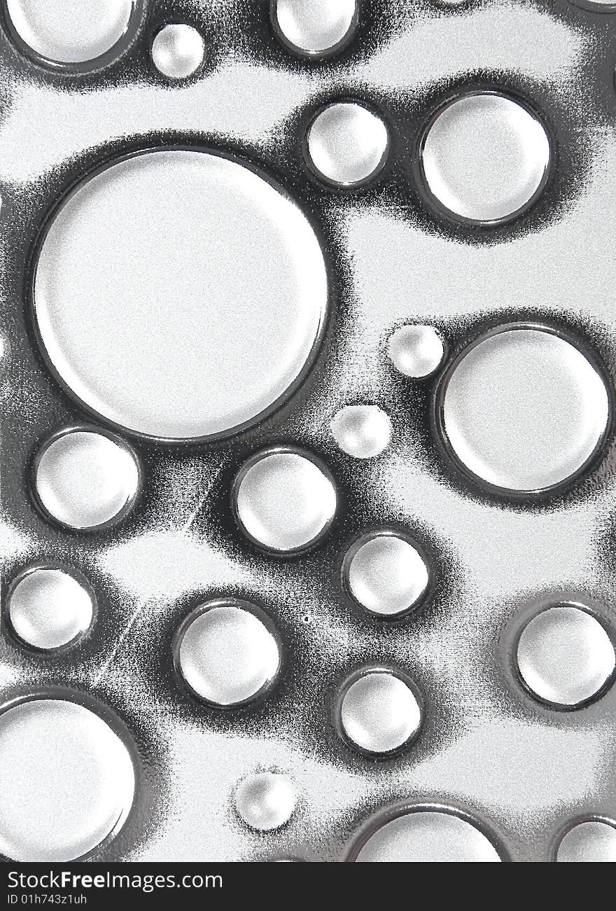 Background of shiny textured metal with circles