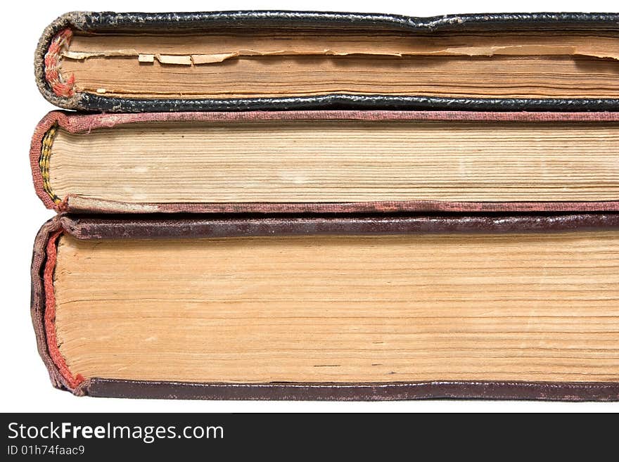 Three antique book isolated on white.