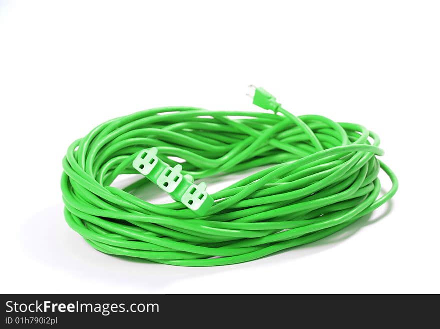 Green extension cord with splitter isolated on white in the studio. Green extension cord with splitter isolated on white in the studio