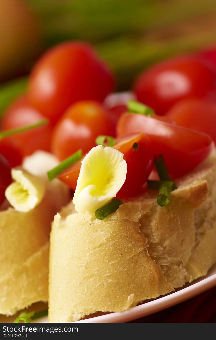 Baguette wich tomatoes,butter and chive. Baguette wich tomatoes,butter and chive