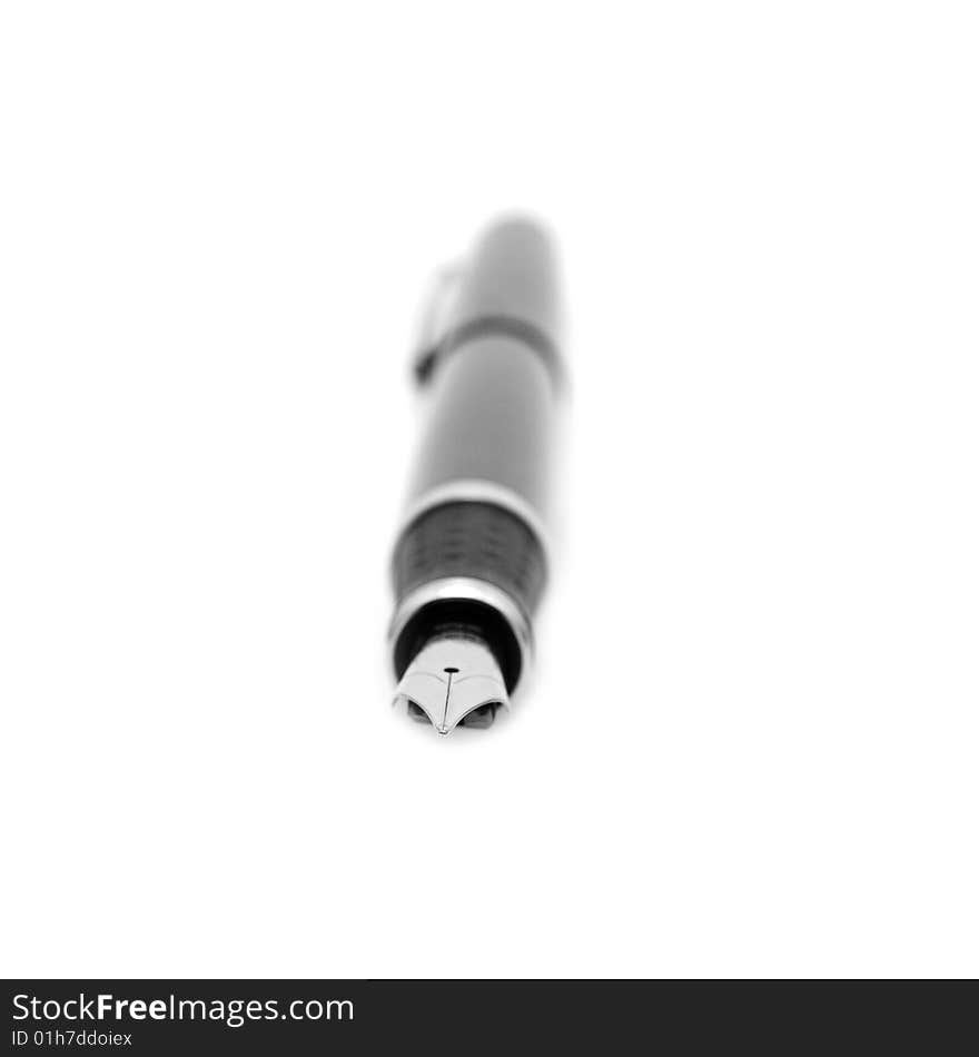 Feather in a pen on a white background. Feather in a pen on a white background