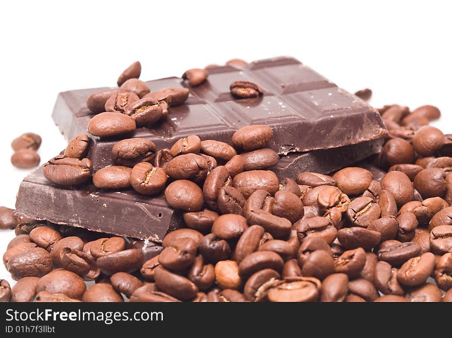 Chocolate and coffee on a white background. Chocolate and coffee on a white background