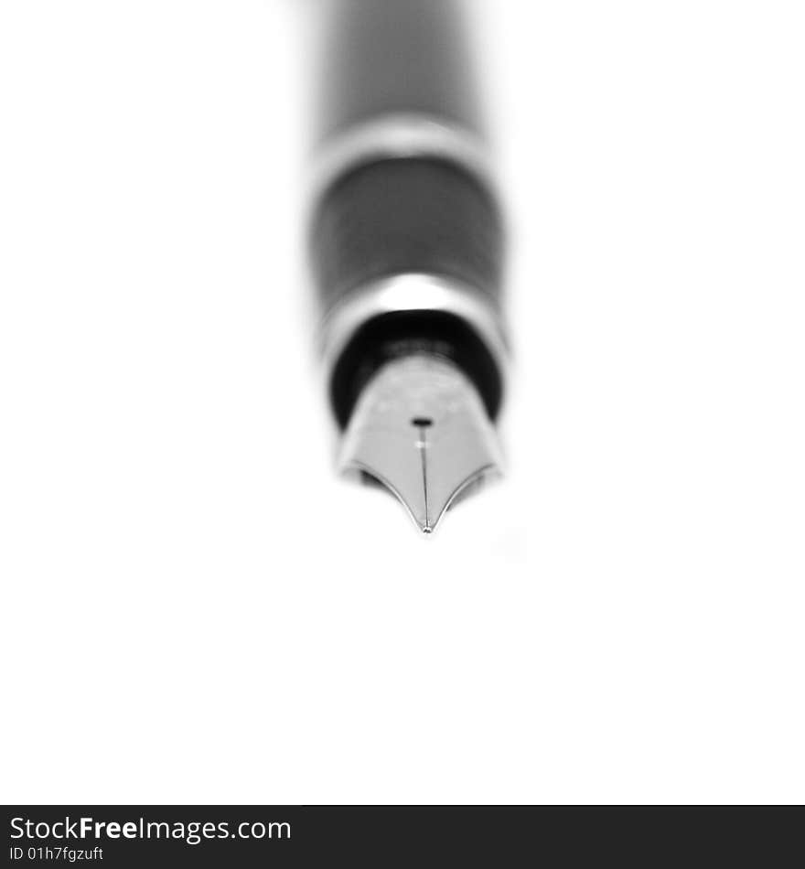 Feather in a pen on a white background