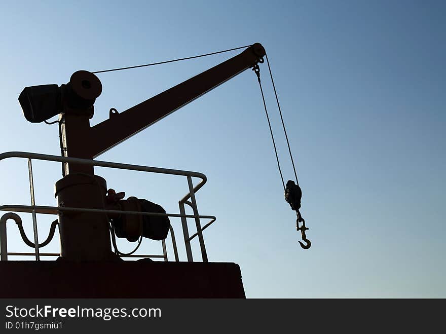 Boat crane with Hook, blue sky background