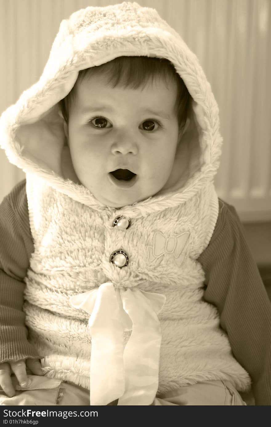 A portrait with little girl being surprised. A portrait with little girl being surprised