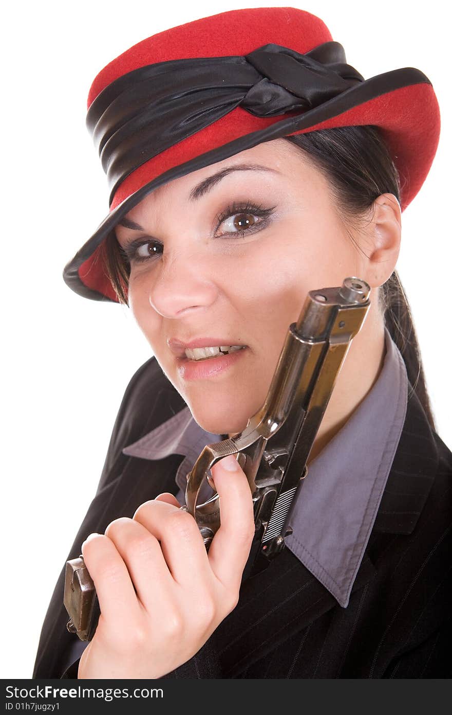 Attractive brunette woman with gun. over white background