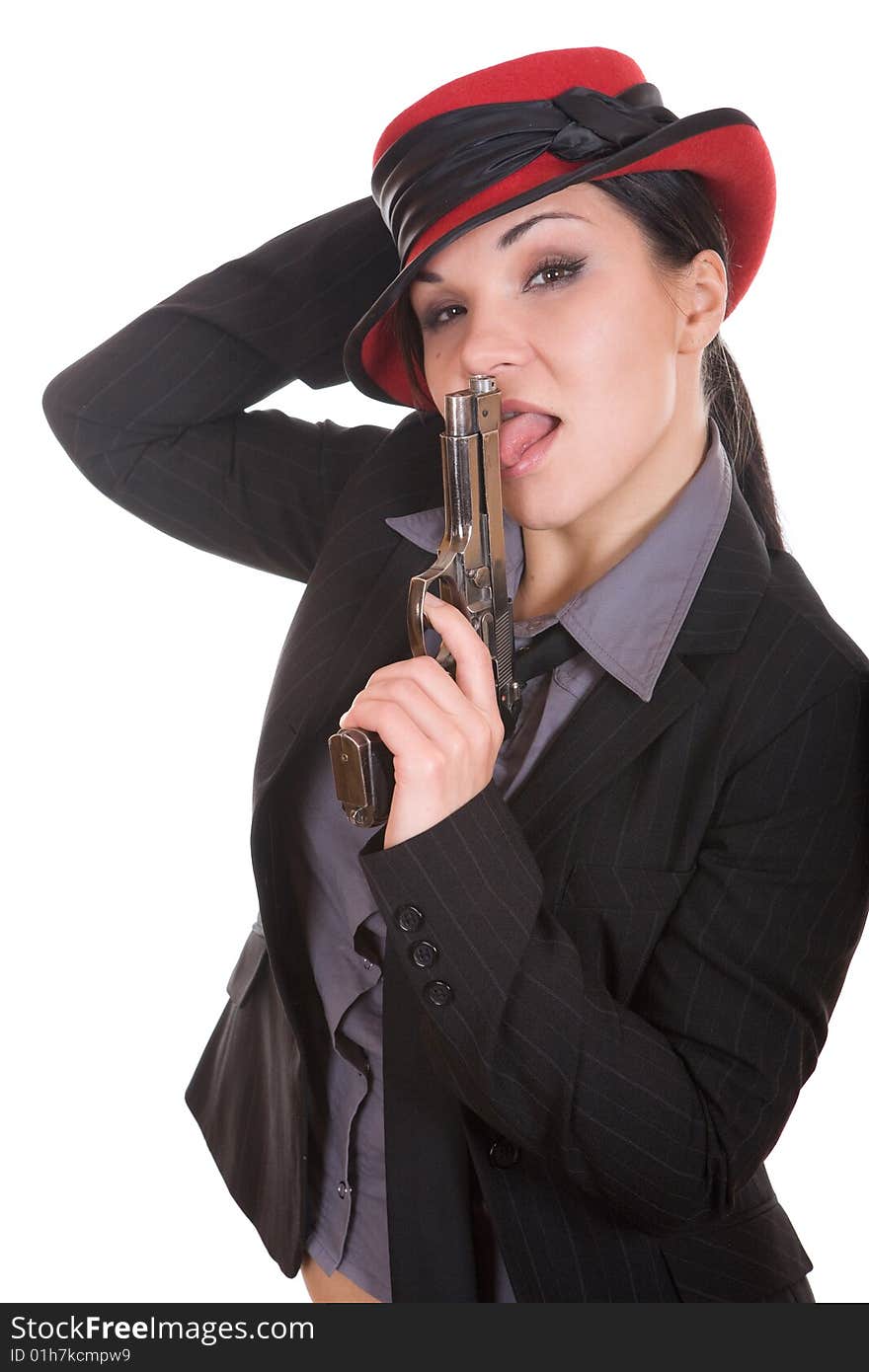 Attractive brunette woman with gun. over white background