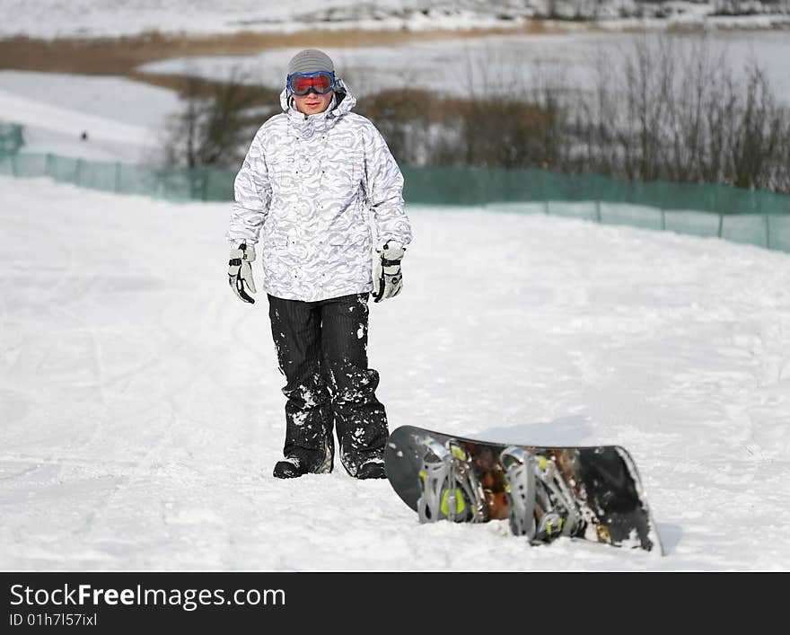 Young adult male snowboarder