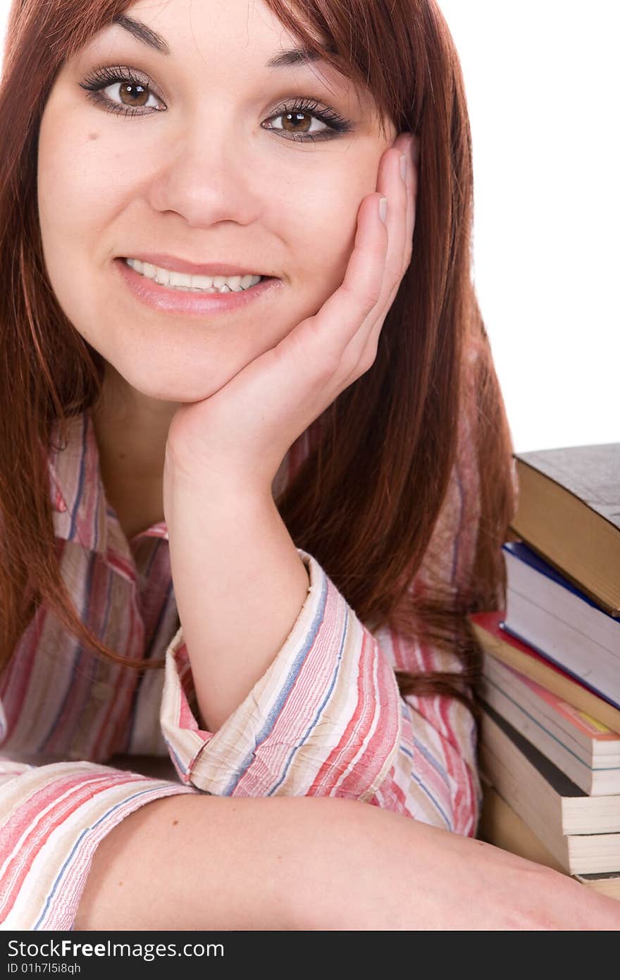 Attractive student with books . over white background